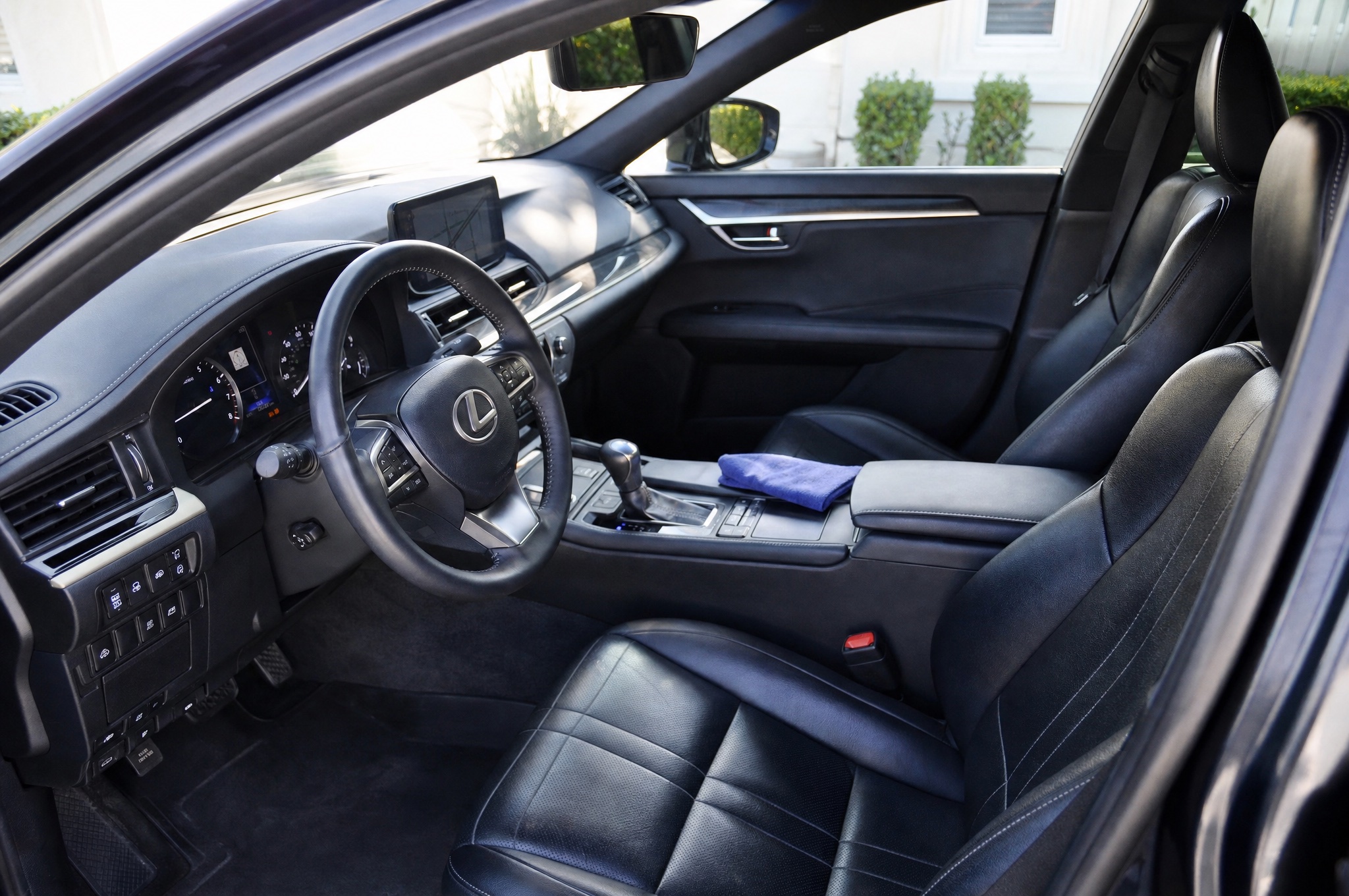Spotless detailed luxury interior — dash, wheel and seats